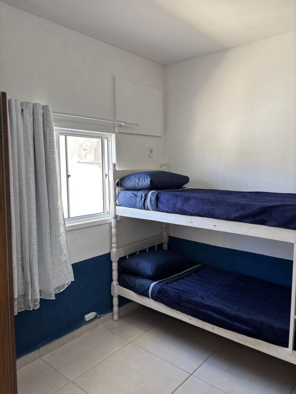 Cama em Dormitório com 4 Camas